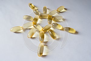 Omega 3 evening primrose oil capsules shaped as a sun