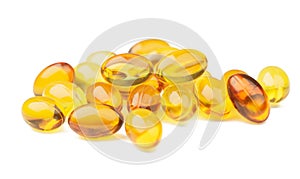 Omega 3 fish oil capsules on  the White Surface. Closeup