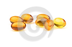 Omega 3 fish oil capsules on  the White Surface. Closeup