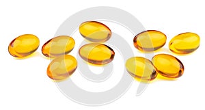 Omega 3 fish oil capsules on  the White Surface. Closeup