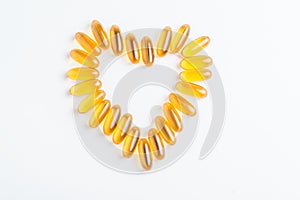 Omega 3 pills in shape of heart