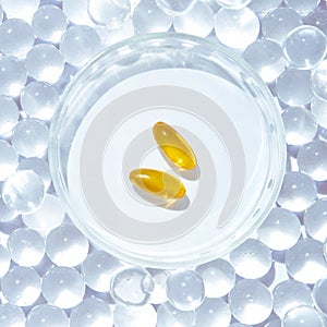 Omega3 gel capsule. Yellow vitamin. Dietology drug. Fish oil supplement