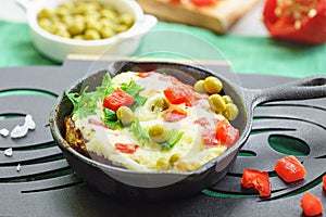 omelet baked with vegetables and cheese