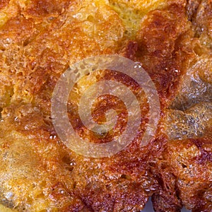 omelet burn closeup texture background