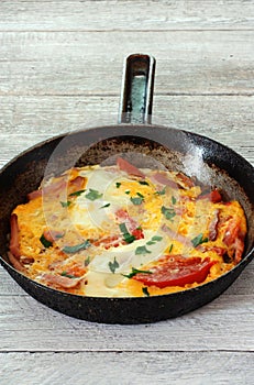 Omelet in frying pan