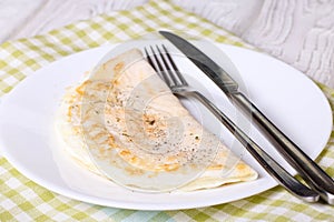 Omelete on a white plate, horizontal
