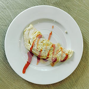 Omelets (or omelettes) are a common breakfast food. They are versatile and not complicated to make. photo