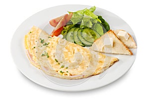 Omelette with ham, tomato and cucumber