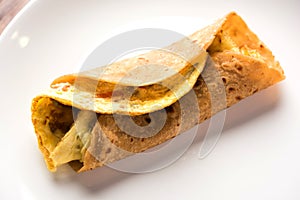 Omelette / omelette chapati roll or Indian bread or roti rolled with omlet.