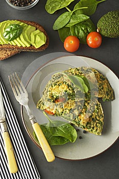 Omeltte with spinach leaves. Healthy omelette for lose weight. Healthy food