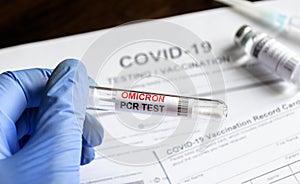 Omicron COVID-19 PCR test in doctor hand