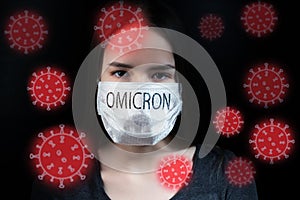 Omicron variant of the coronavirus mutation of the new strain covid 19, woman in protective medical mask