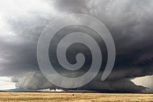 Ominous wall cloud and supercell thunderstorm