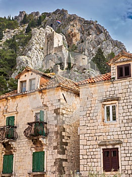 Omis Croatia karst mountains houses and wall