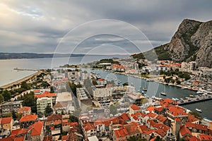 Omis town surrounded by mountains - Travel in Croatia.