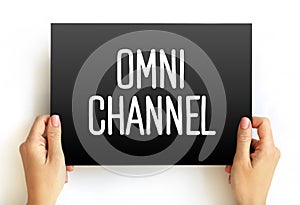 Omni channel - neologism portmanteau describing an advertising strategy, text on card concept background