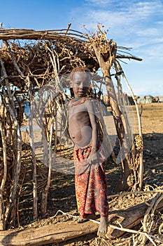 Dasanesh children in village, Omorate, Omo Valley, Ethiopia