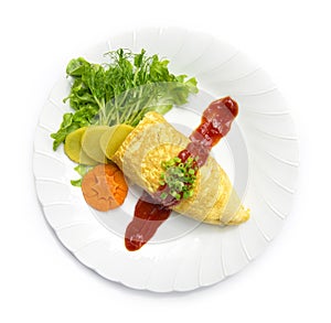 Omurice inside fried rice with egg in tomato sauce