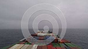 Onboard of huge Container ship during underway, center view, foggy weather