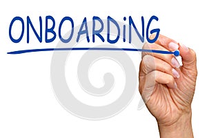 Onboarding - female hand with pen writing text photo