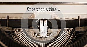 Once upon a time symbol. Words `Once upon a time` typed on retro typewriter. Business and once upon a time concept. Copy space