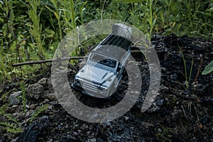 Ð¡oncept travel and racing  for four wheel drive off road vehicle. 4v4 SUV makes its way across rough terrain Toy car