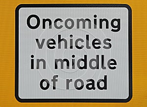 Oncoming vehicles sign