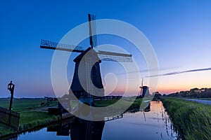 Ondermolen D windmill near Schermerhorn city in Netherlands