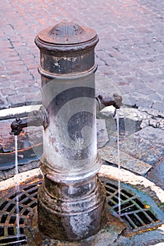 One of the 2,500 free flowing drinking fountains in Rome, Italy