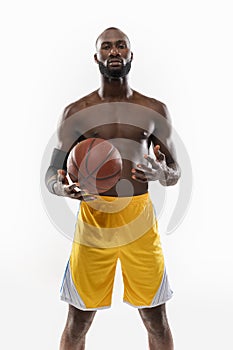 one african man basketball player holding ball in silhouette isolated white background