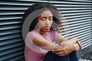 One alone black young woman feeling sad and blue