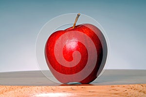One Apple Closeup on a Table Background