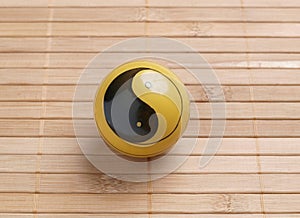 One baoding ball on bamboo background