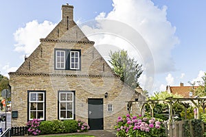 One of the beautiful old cottages in the place Hollum on the island of Ameland