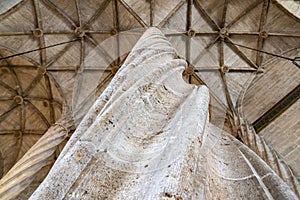 One of the beautiful twisted pillars supporting the ceiling of the silk trading building `Llotja de la Seda` in Valencia, Spain photo