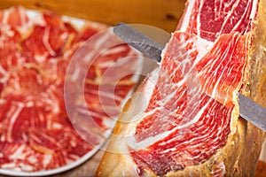 Slicing Spanish jamon iberico