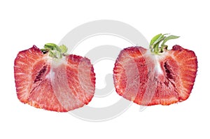 One big red ripe sliced strawberry isolated on white background