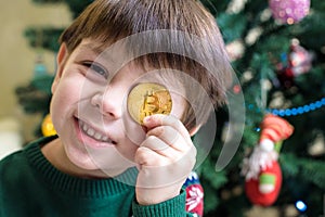 One Bitcoin in the hand of young boy. Concept. Crypto digital gold