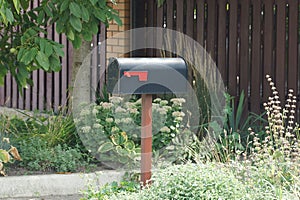 One black letterbox on a post