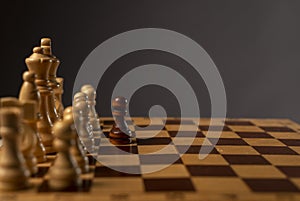 One black pawn against many others. Different against monopoly