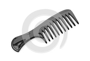 One black plastic comb isolated on white, top view
