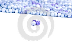 One blue and two violet little pearls