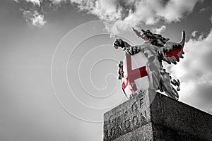 One of the boundary dragons statues that mark your entry into the City of London in black and white with copy space. The Dragon