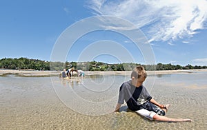 one boy child Left out @ beach photo