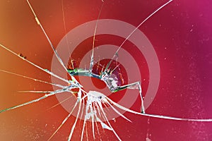 Broken red glass window