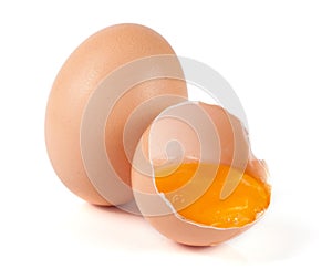 One brown egg and broken egg isolated on white background