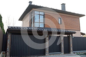 one brown private wooden house with windows