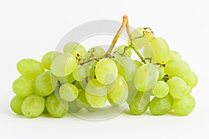 One bunch of ripe organic white grapes isolated on white background, top view
