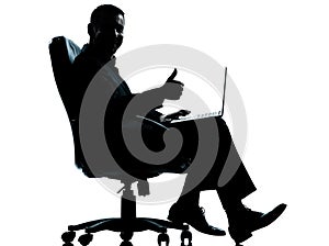 One business man computer thumb up sitting