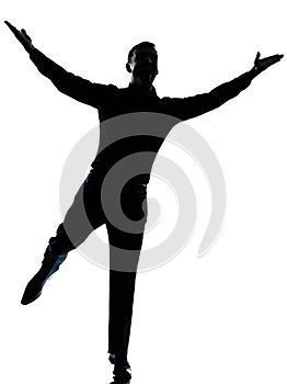 One business man happy spreading arms silhouette